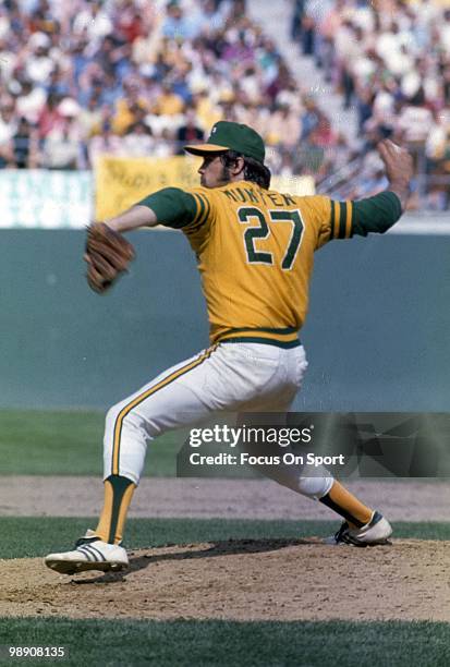 S: Pitcher Jim Catfish Hunter of the Oakland Athletics pitches during a circa early 1970's Major League baseball game at the Oakland Coliseum in...