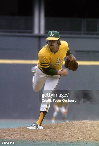 Pitcher Jim Catfish Hunter Oakland Athletics pitches against the Cincinnati Red during game seven of World Series October 22, 1972 at Riverfront...