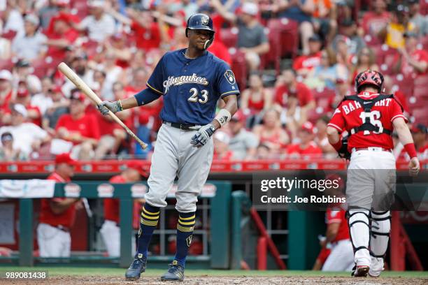 Keon Broxton of the Milwaukee Brewers reacts after striking out to end the seventh inning against the Cincinnati Reds at Great American Ball Park on...