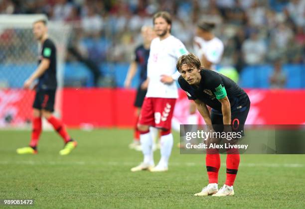 Luka Modric of Croatia looks dejected after missing a penalty during the 2018 FIFA World Cup Russia Round of 16 match between Croatia and Denmark at...