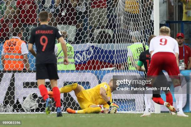 Kasper Schmeichel of Denmark saves a penalty from Luka Modric of Croatia during the 2018 FIFA World Cup Russia Round of 16 match between Croatia and...