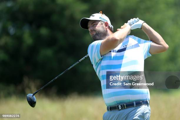 Marc Leishman of Australia hits off the second tee during the final round of the Quicken Loans National at TPC Potomac on July 1, 2018 in Potomac,...