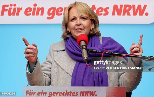 Germany's social democratic SPD candidate in the state of North Rhine-Westphalia Hannelore Kraft gesture as she addresses an election rally in the...