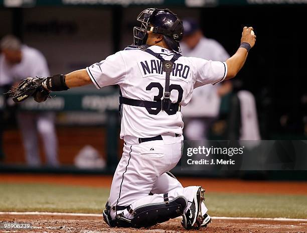 Catcher Dioner Navarro of the Tampa Bay Rays catches against the Kansas City Royals during the game at Tropicana Field on May 1, 2010 in St....