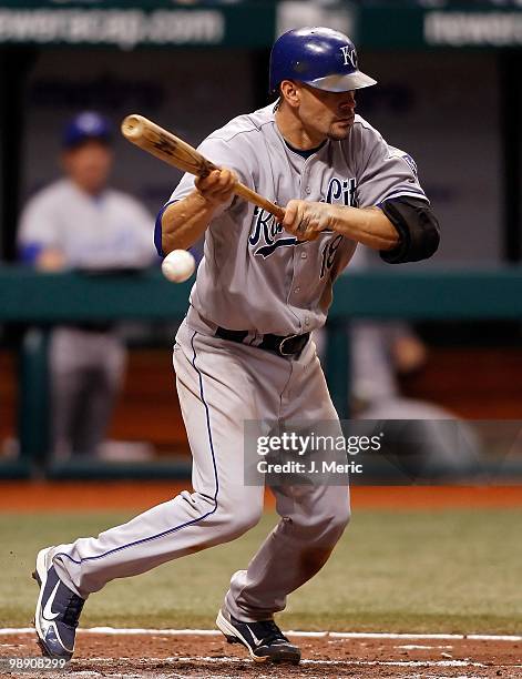 Catcher Jason Kendall of the Kansas City Royals attempts a bunt against the Tampa Bay Rays during the game at Tropicana Field on May 1, 2010 in St....