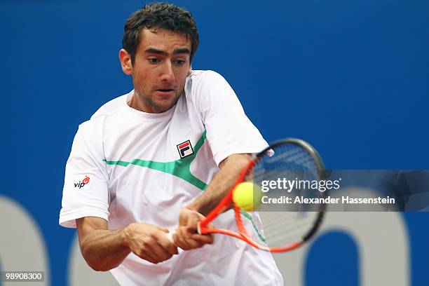 Marin Cilic of Croatia plays a back hand during his matach against Nicolas Almagro of Spain on day 6 of the BMW Open at the Iphitos tennis club on...