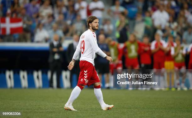 Lasse Schone of Denmark looks dejected after missing his teams first penalty during a penalty shoot out during the 2018 FIFA World Cup Russia Round...