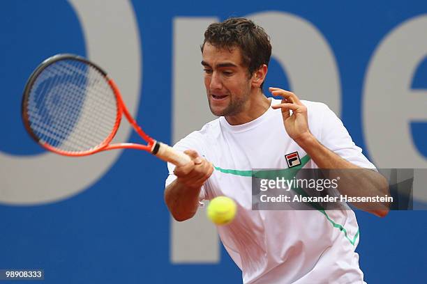 Marin Cilic of Croatia plays a fore hand during his matach against Nicolas Almagro of Spain on day 6 of the BMW Open at the Iphitos tennis club on...