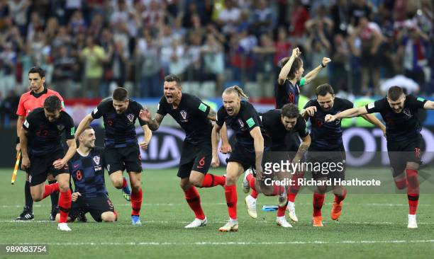 Croatia players celebrate following their sides victory in a penalty shoot out during the 2018 FIFA World Cup Russia Round of 16 match between...