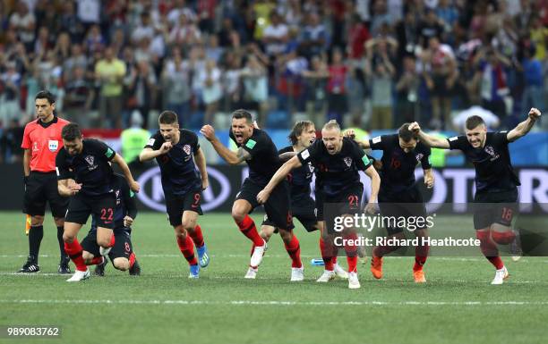 Croatia players celebrate following their sides victory in a penalty shoot out during the 2018 FIFA World Cup Russia Round of 16 match between...