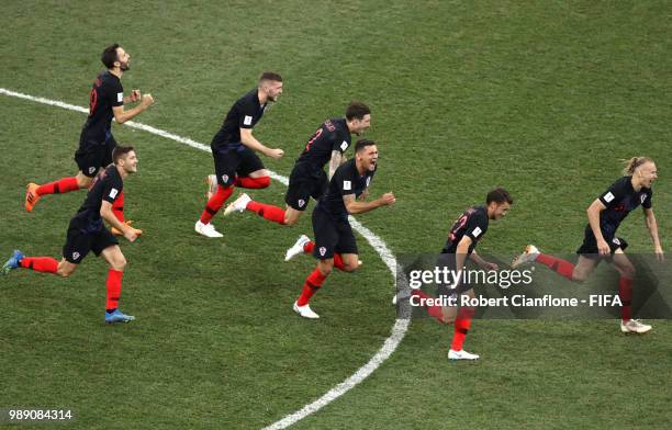 Croatia players celebrate their victory following the 2018 FIFA World Cup Russia Round of 16 match between Croatia and Denmark at Nizhny Novgorod...