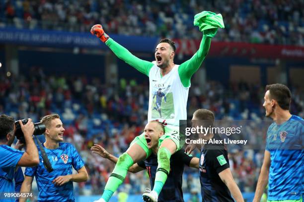 Danijel Subasic of Croatia celebrates following his sides victory in a penalty shoot out during the 2018 FIFA World Cup Russia Round of 16 match...