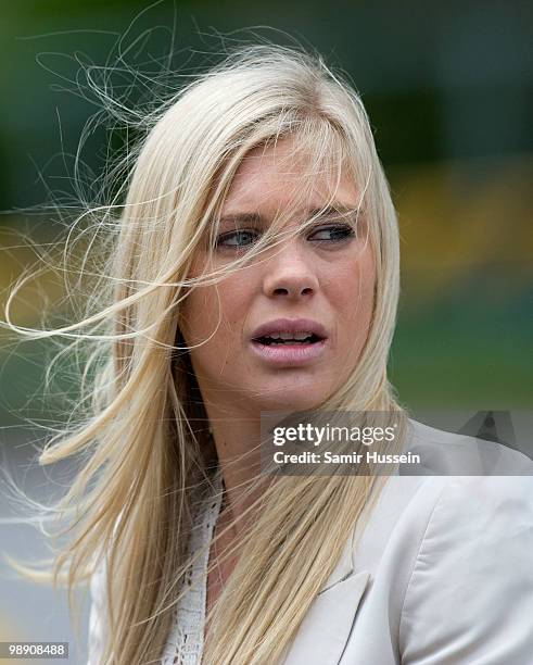 Chelsy Davy looks on after Prince Harry received his flying badges at the Museum of Army Flying on May 7, 2010 in Middle Wallup, England.