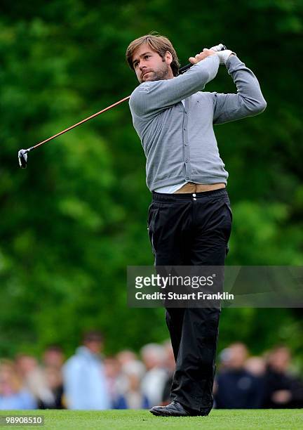 Robert Rock of England plays his approach shot on the 18th hole during the second round of the BMW Italian Open at Royal Park I Roveri on May 7, 2010...