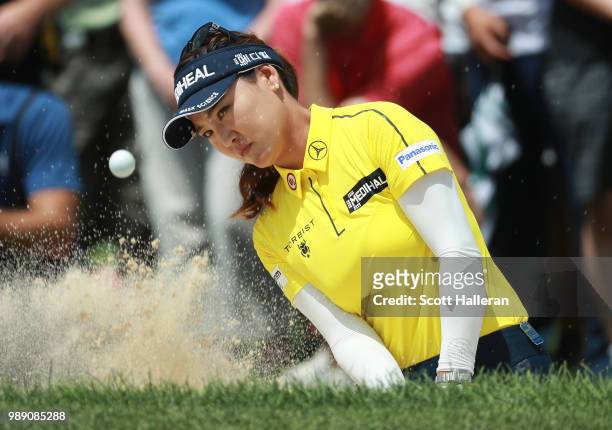 So Yeon Ryu of South Korea plays a bunker shot on the 15th hole during the final round of the KPMG Women's PGA Championship at Kemper Lakes Golf Club...