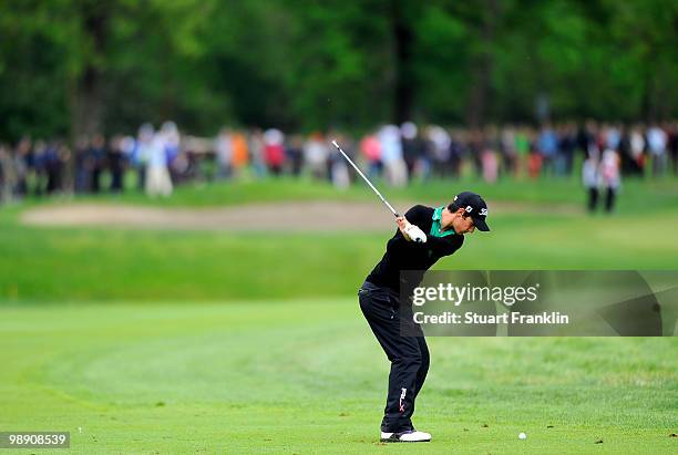 Matteo Manassero of Italy plays his approach shot on the 11th hole during the second round of the BMW Italian Open at Royal Park I Roveri on May 7,...