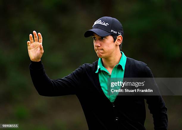Matteo Manassero of Italy celebrates his putt on the 11th hole during the second round of the BMW Italian Open at Royal Park I Roveri on May 7, 2010...