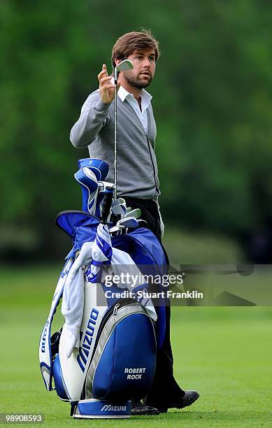 Robert Rock of England selects his club on the 14th hole during the second round of the BMW Italian Open at Royal Park I Roveri on May 7, 2010 in...