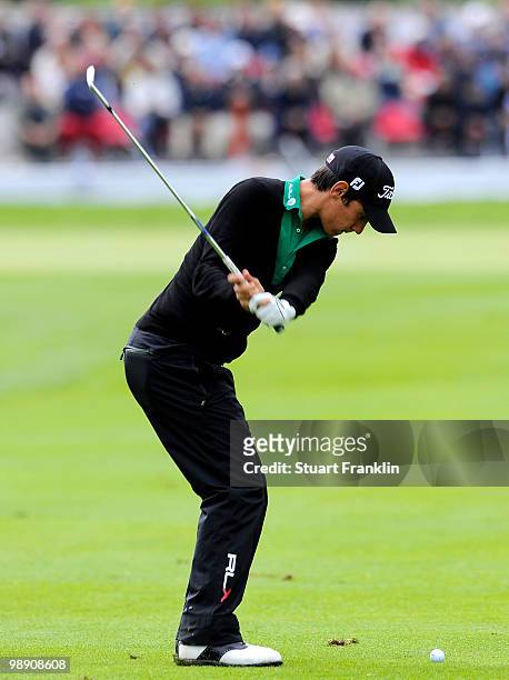 Matteo Manassero of Italy plays his approach shot on the nineth hole during the second round of the BMW Italian Open at Royal Park I Roveri on May 7,...