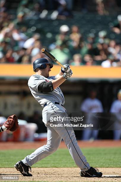 Travis Hafner of the Cleveland Indians hitting during the game against the Oakland Athletics at the Oakland Coliseum on April 24, 2010 in Oakland,...