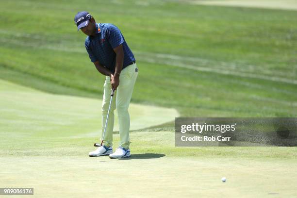 Anirban Lahiri of India putts on the first green during the final round of the Quicken Loans National at TPC Potomac on July 1, 2018 in Potomac,...