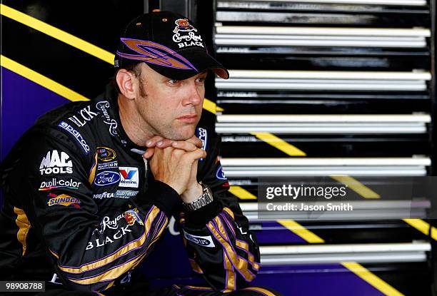 Matt Kenseth, driver of the Crown Royal Black Ford, sits in the garage during practice for the NASCAR Sprint Cup Series SHOWTIME Southern 500 at...