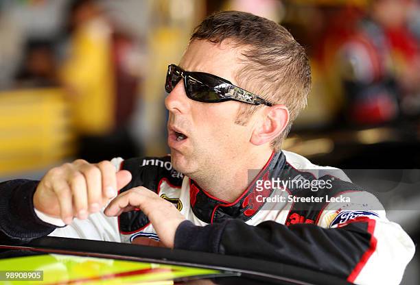 Greg Biffle, driver of the 3M Ford, looks on in the garage during practice for the NASCAR Sprint Cup Series SHOWTIME Southern 500 at Darlington...