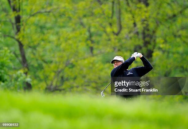 Ryder Cup captain Colin Montgomerie of Scotland plays his approach shot on the 14th hole during the second round of the BMW Italian Open at Royal...