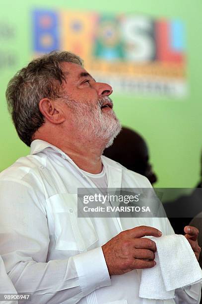 Brazilian President Luiz Inacio da Silva gestures as he delivers a speech during the launching of the oil tanker "Joao Candido" at Suape Harbour in...