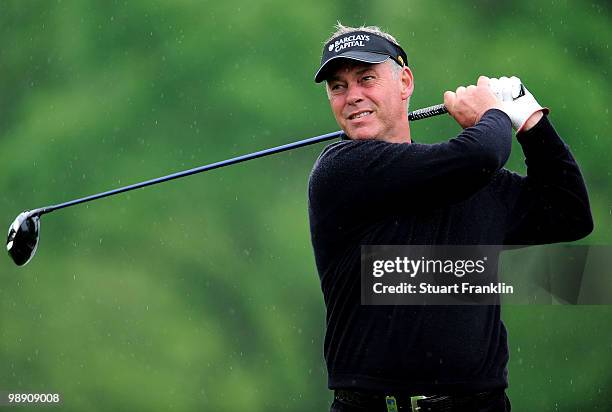 Darren Clarke of Northern Ireland plays his tee shot on the 16th hole during the second round of the BMW Italian Open at Royal Park I Roveri on May...