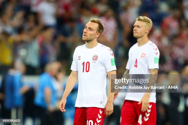 Christian Eriksen of Denmark looks dejected after his team lost a penalty shootout during the 2018 FIFA World Cup Russia Round of 16 match between...