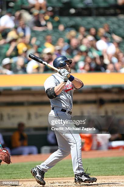 Travis Hafner of the Cleveland Indians hitting during the game against the Oakland Athletics at the Oakland Coliseum on April 24, 2010 in Oakland,...