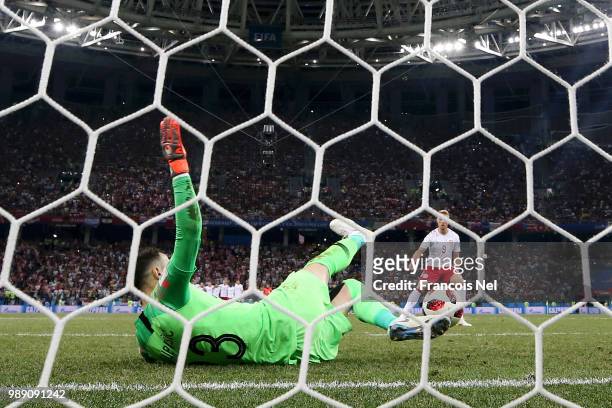Danijel Subasic of Croatia saves Denmark's fifth penalty taken by Nicolai Jorgensen during penalty shoot out following the 2018 FIFA World Cup Russia...