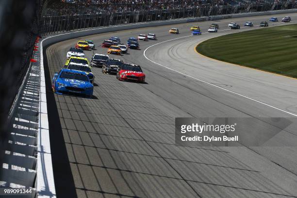 Ryan Blaney, driver of the PPG Ford, leads a pack of cars during the Monster Energy NASCAR Cup Series Overton's 400 at Chicagoland Speedway on July...