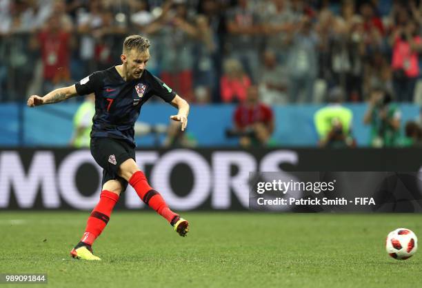 Ivan Rakitic of Croatia takes and scores the winning penalty during the 2018 FIFA World Cup Russia Round of 16 match between Croatia and Denmark at...
