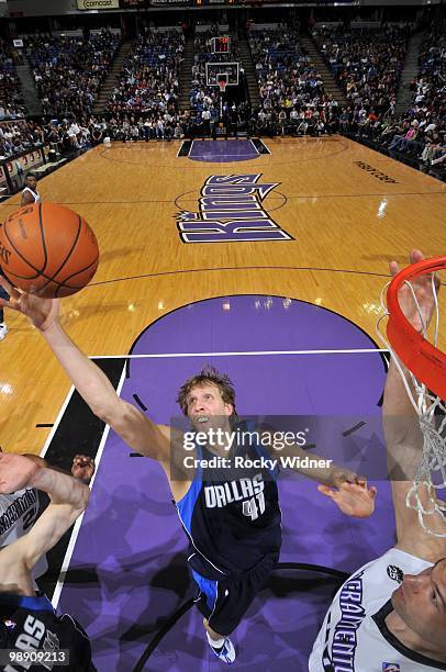 Dirk Nowitzki of the Dallas Mavericks rebounds during the game against the Sacramento Kings at Arco Arena on April 10, 2010 in Sacramento,...
