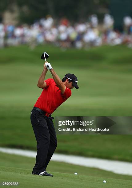 Jason Day of Australia hits his approach shot from the fairway on the ninth hole during the second round of THE PLAYERS Championship held at THE...