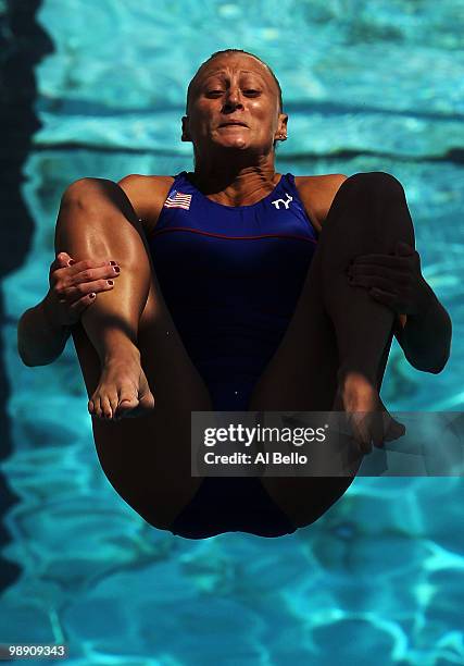 Allison Brennan of the USA dives during the Women's 3 meter springboard preliminaries at the Fort Lauderdale Aquatic Center during Day 2 of the AT&T...