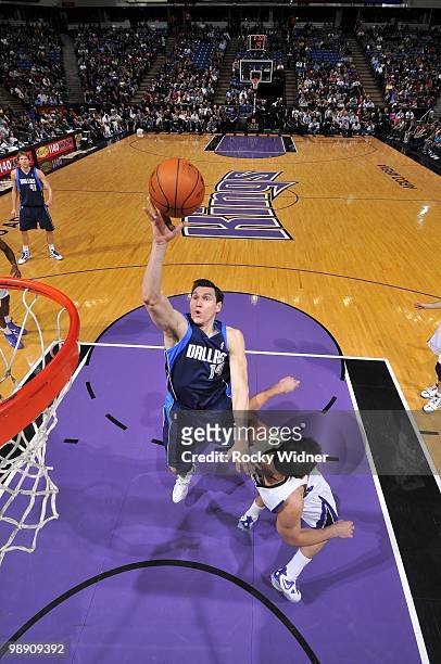 Eduardo Najera of the Dallas Mavericks shoots a layup against Omri Casspi of the Sacramento Kings during the game at Arco Arena on April 10, 2010 in...