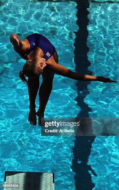 Allison Brennan of the USA dives during the Women's 3 meter springboard preliminaries at the Fort Lauderdale Aquatic Center during Day 2 of the AT&T...