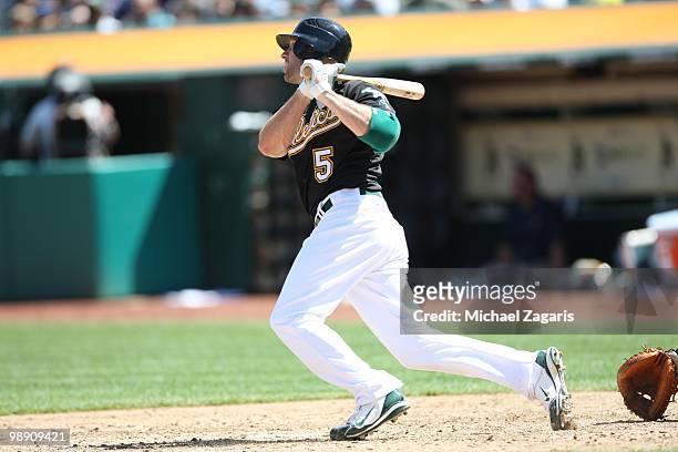 Kevin Kouzmanoff of the Oakland Athletics hitting during the game against the Cleveland Indians at the Oakland Coliseum on April 25, 2010 in Oakland,...