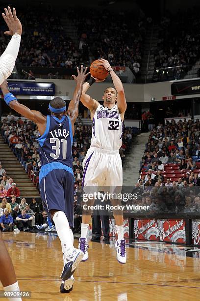 Francisco Garcia of the Sacramento Kings shoots a jump shot against Jason Terry of the Dallas Mavericks during the game at Arco Arena on April 10,...