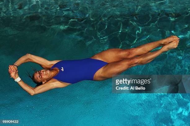 Tania Cagnotto of Italy dives during the Women's 3 meter springboard preliminaries at the Fort Lauderdale Aquatic Center during Day 2 of the AT&T USA...