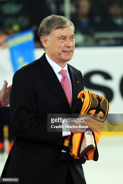 German President Horst Koehler opens the IIHF World Championship group D match between USA and Germany at Veltins Arena on May 7, 2010 in...