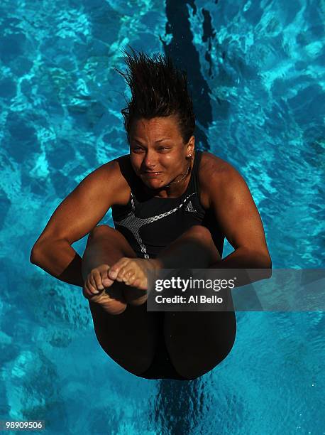 Nora Barta of Hungary dives during the Women's 3 meter springboard preliminaries at the Fort Lauderdale Aquatic Center during Day 2 of the AT&T USA...