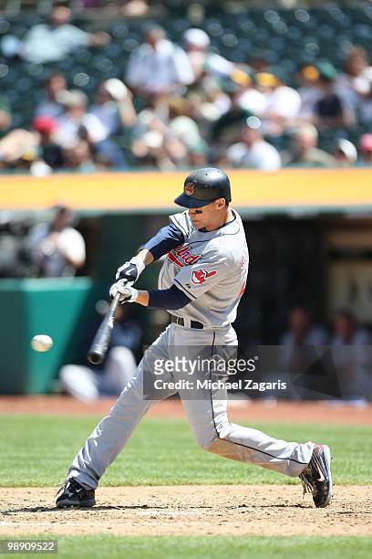 Grady Sizemore of the Cleveland Indians hitting during the game against the Oakland Athletics at the Oakland Coliseum on April 25, 2010 in Oakland,...