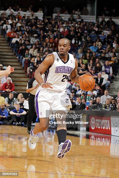 Carl Landry of the Sacramento Kings moves the ball up court during the game against the Dallas Mavericks at Arco Arena on April 10, 2010 in...