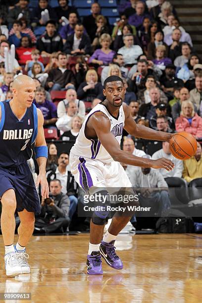 Tyreke Evans of the Sacramento Kings moves the ball up court against Jason Kidd of the Dallas Mavericks during the game at Arco Arena on April 10,...