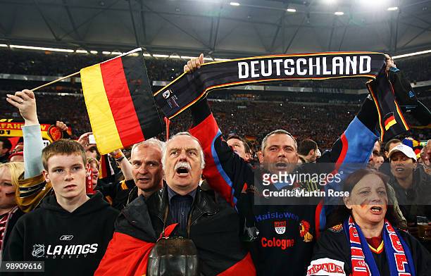 Supporters of Germany cheer during the IIHF World Championship group D match between USA and Germany at Veltins Arena on May 7, 2010 in...