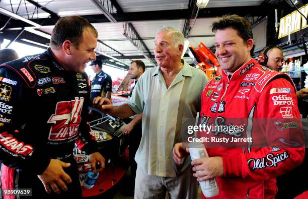 Ryan Newman , driver of the Haas Automation Chevrolet, talks with NASCAR legend David Pearson , and Tony Stewart , driver of the Old Spice/Office...